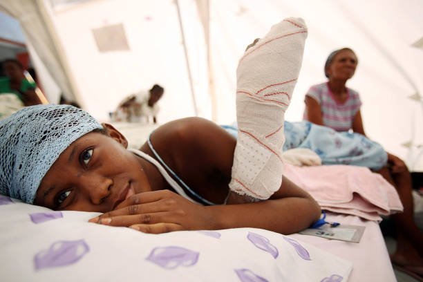A child receiving medical care and support